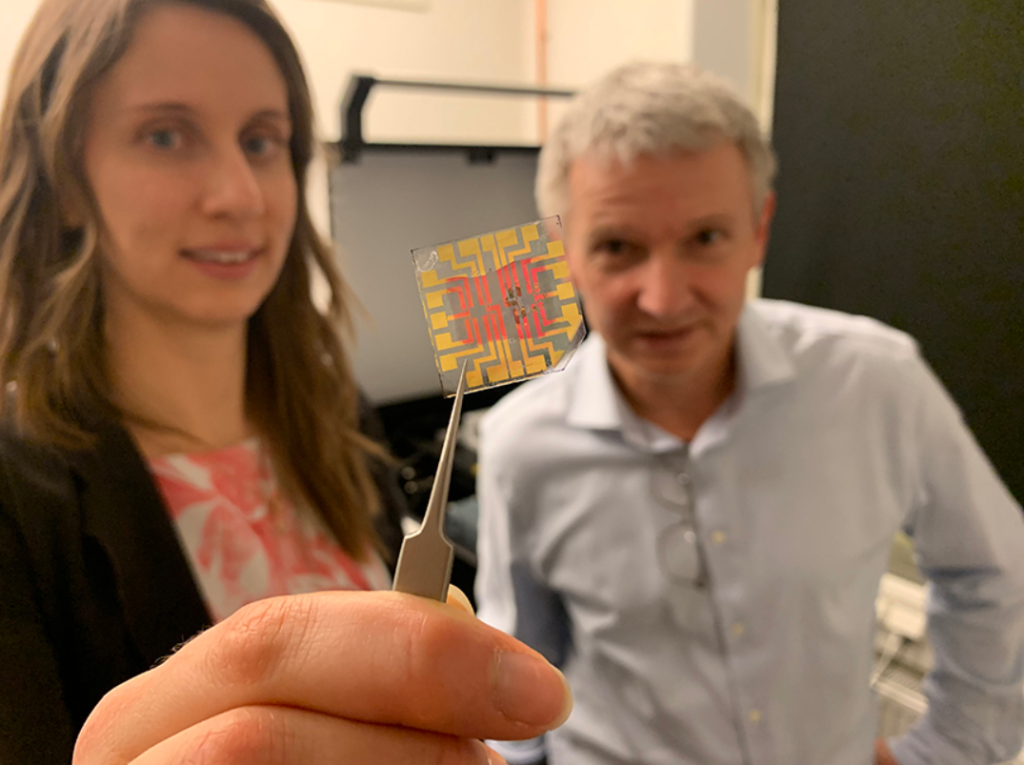 Researchers Erica Zeglio, left, and Frank Niklaus show a transistor which they printed using a 3D microprinter. Photo via KTH Royal Institute of Technology.