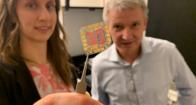 Researchers Erica Zeglio, left, and Frank Niklaus show a transistor which they printed using a 3D microprinter. Photo via KTH Royal Institute of Technology.