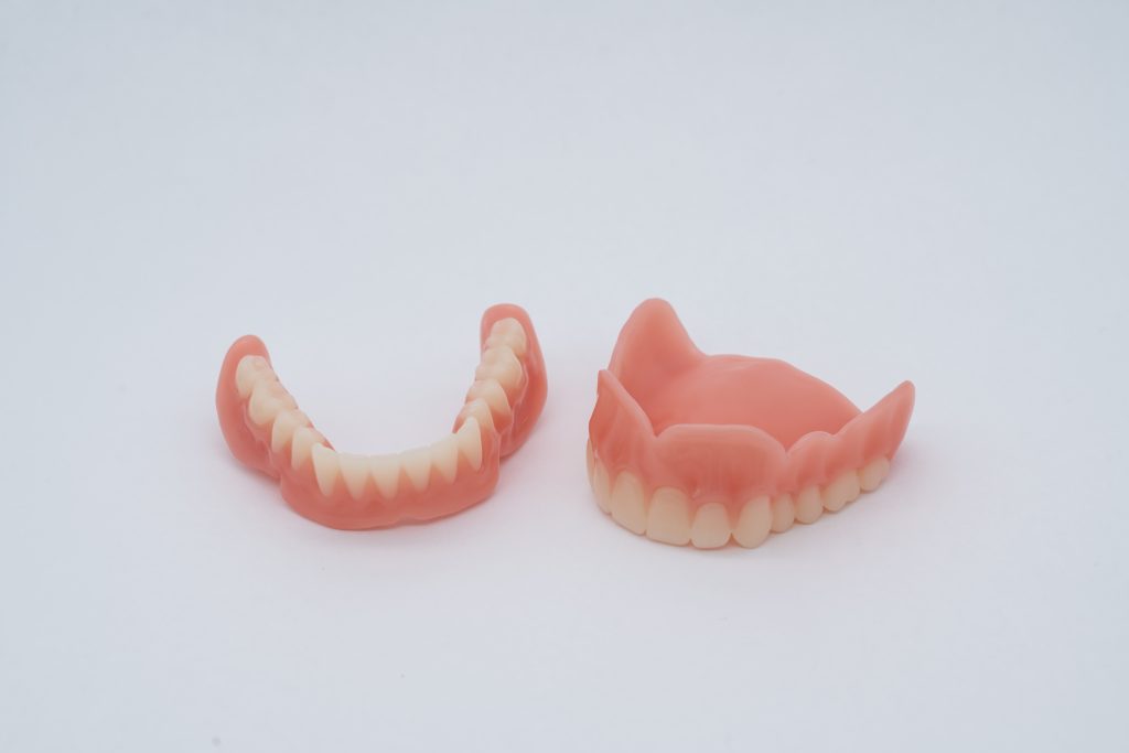 Upper and lower 3D printed dentures from 3D Systems. Photo via 3D Systems.