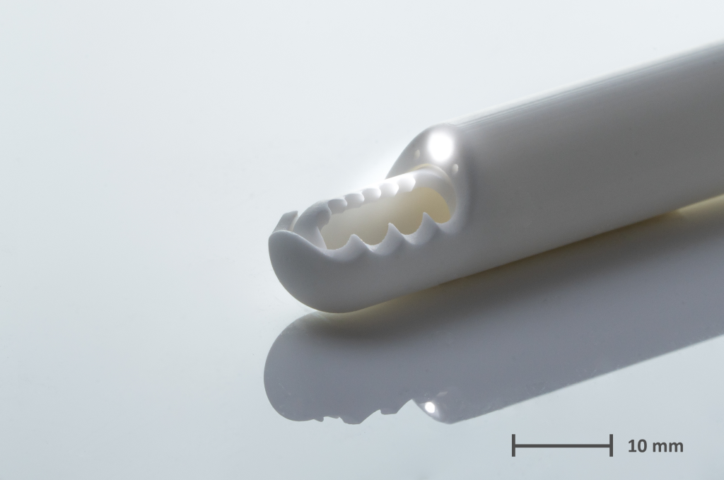 3D-printed ceramic arthroscopic knee shaver with an integrated channel for optical fibers. Image via Lithoz.