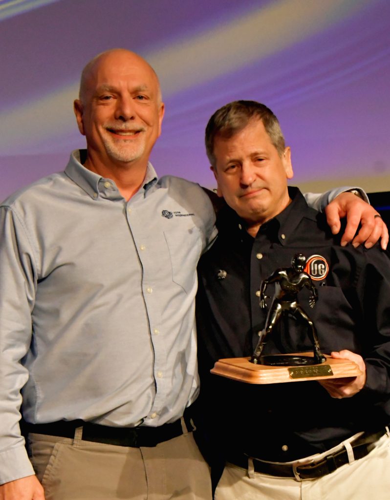 Gary Rabinovitz (right) received AMUG's Lifetime Achievement Award from friend and colleague, Paul Bates. Photo via AMUG.