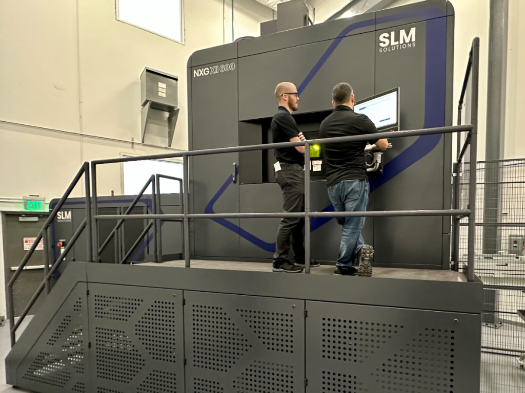 As part of its announced expansion, Sintavia purchased a second SLM NXG XII 600 printer. Photo via Sintavia.