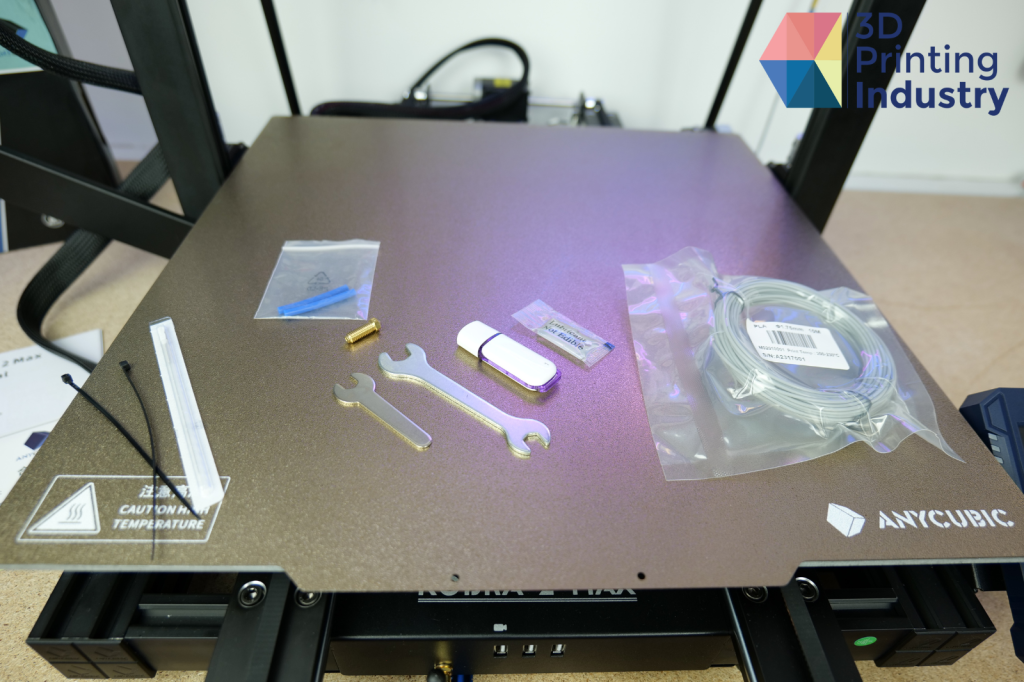 The Kobra 2 Max’s extruder, 3D print bed, and touch screen UI. Photos by 3D Printing Industry.
