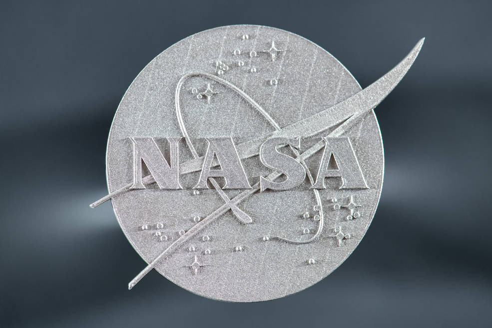NASA logo 3D printed with GRX-810. Photo via NASA/Jordan Salkin