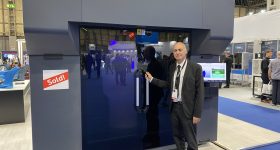 Avi Cohen, VP Sales and Marketing at Massivit, and the new Massivit 3000. Photo by 3D Printing Industry.