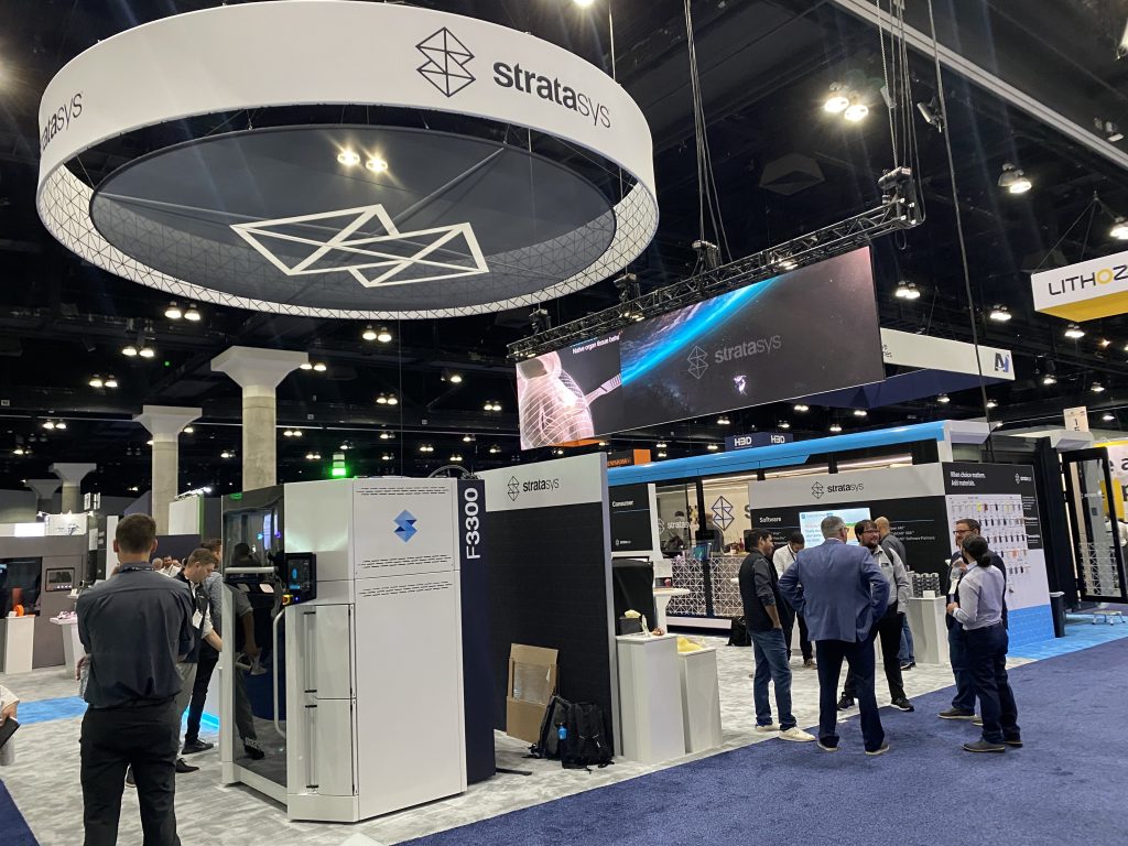 The Stratasys Booth. Photo by 3D Printing Industry.