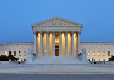 Panorama of the west facade of United States Supreme Court Building at dusk in Washington, D.C. Photo Via Joe Ravi / CC-BY-SA 3.0