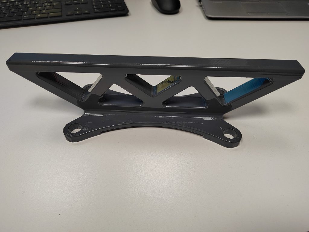 A 3D printed antenna holder that encapsulates the antenna wire. Photo via ArcelorMittal.