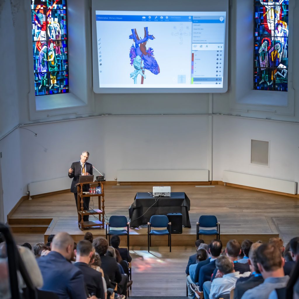 Dr. David Hoganson speaking at the Materialise 3D Printing in Hospitals Forum 2025. Photo via Materialise.