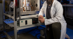 Dr Gilles Bailet with the NextSpace TestRig. Photo via University of Glasgow.