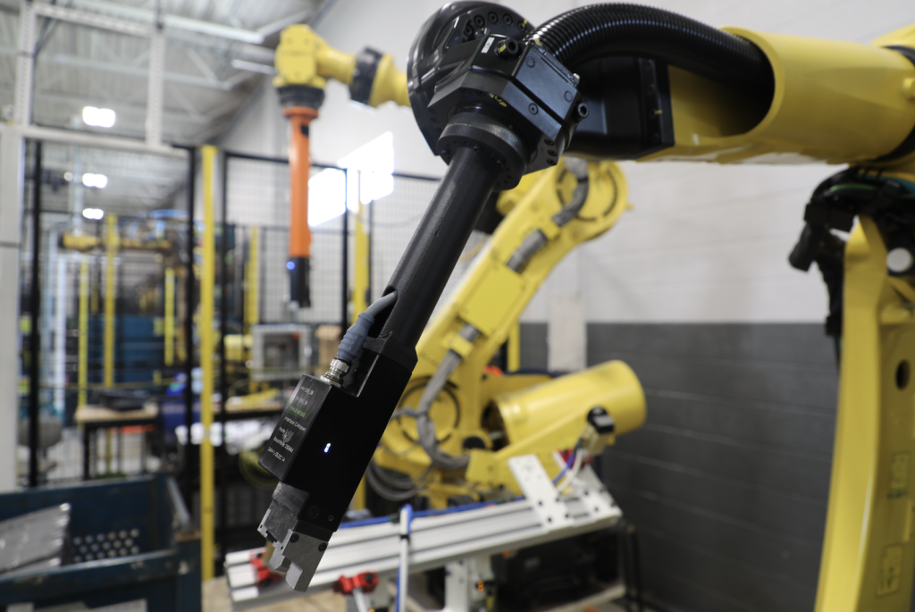 Robotic arm that is being used in the new North American Stratasys Tooling Center. Photo via