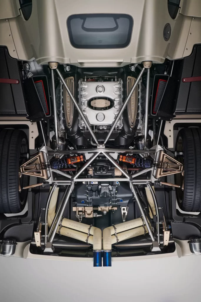 Pagani Utopia’s underbody reveals the meticulously engineered V12 engine and transmission assembly, featuring Xtrac’s seven-speed gearbox integrated with Conflux’s heat exchanger technology. Photo via Conflux Technology.