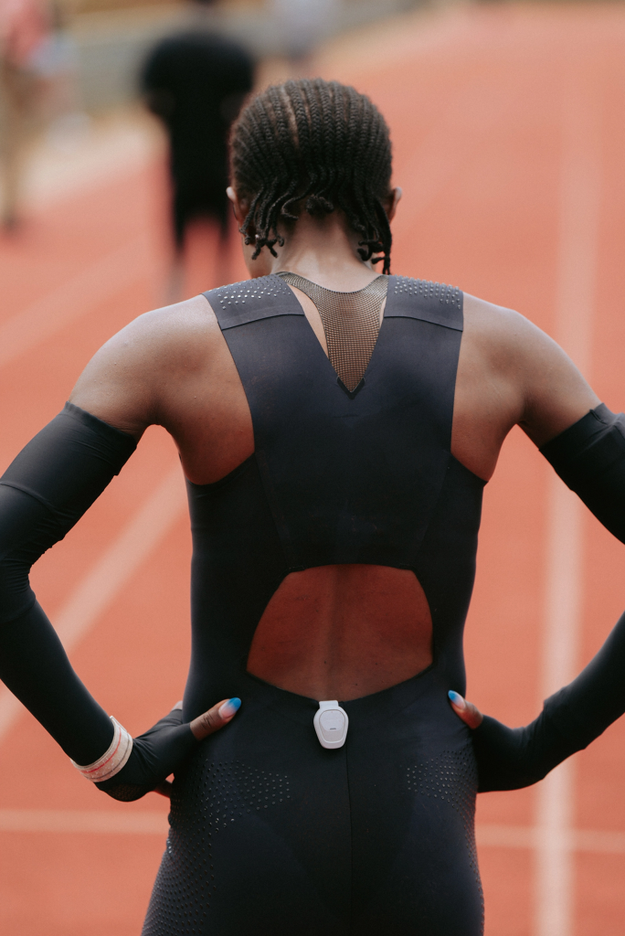 Middle-distance runner Faith Kipyegon wearing the 3D printed FlyWeb bra during training. Photo via Nike.