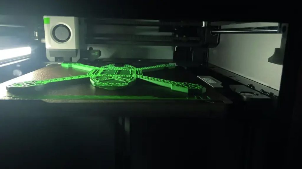 An FPV drone being 3D printed on the British Army's Bambu Lab 3D printer. Photo via the British Army.