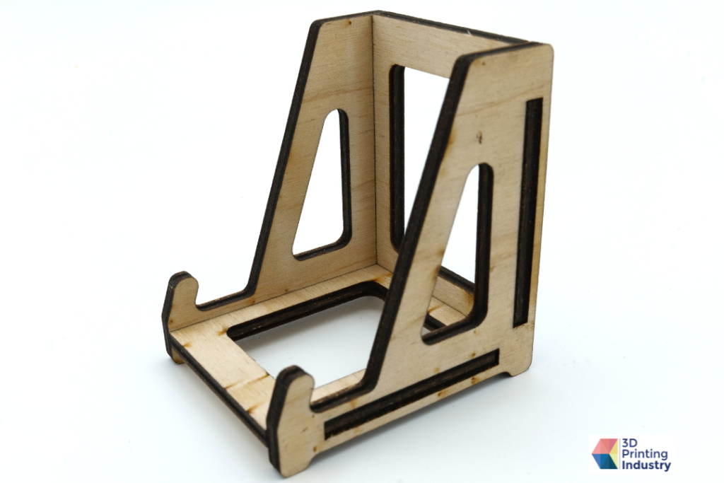 Laser-cut wooden phone stand. Photos by 3D Printing Industry.