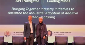 Karsten Heuser, Vice President Additive Manufacturing at Siemens, and Brigitte de Vet-Veithen, CEO of Materialise, on stage during the announcement of the Additive Manufacturing Alliance. Image via Materialise.