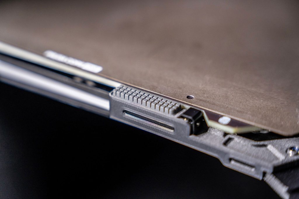 Integrated nozzle wiper. Photo via Prusa Research.