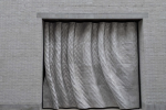 Unfold Installs 3D Printed Aluminum Curtain as Main Gate of Design Museum Gent’s New Wing