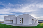 Three AMTG construction 3D printers produce walls for Mella shopping center